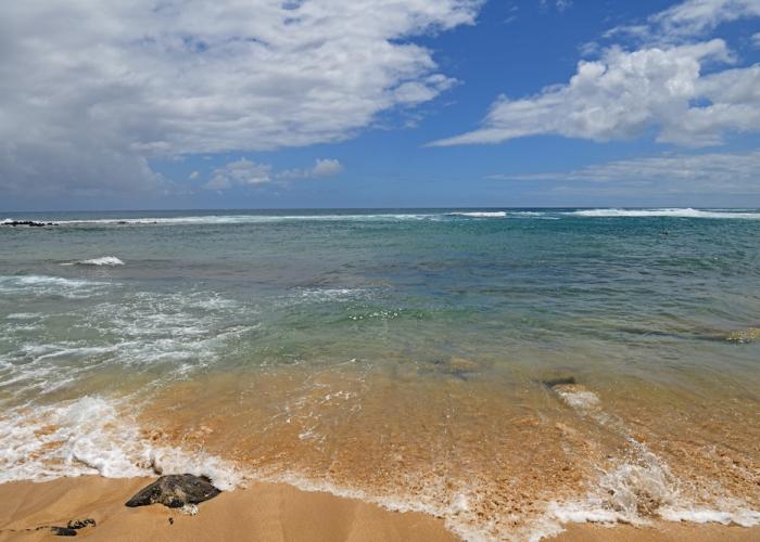 Poipu Beach Park in community of Poipu on southern coast of Kauai island in Hawaii. 
