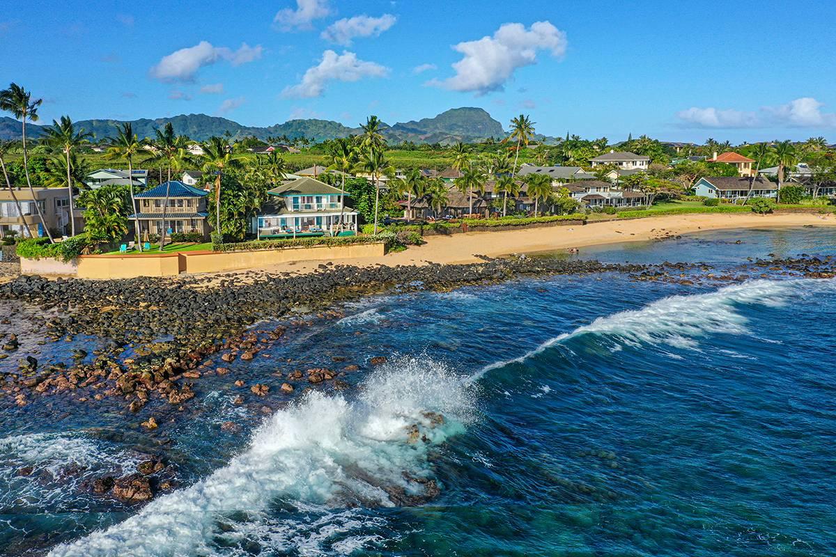 Beachfront vacation home and Kauai coastline Beachfront vacation home and Kauai coastline