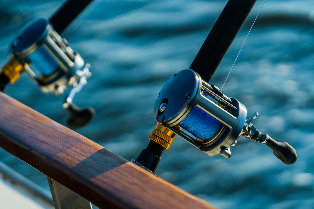 fishing poles on a charter boat