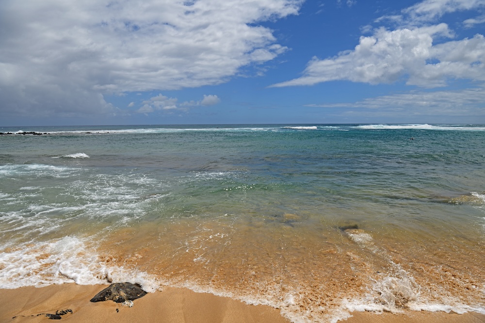 Poipu Beach Park in community of Poipu on southern coast of Kauai island in Hawaii.